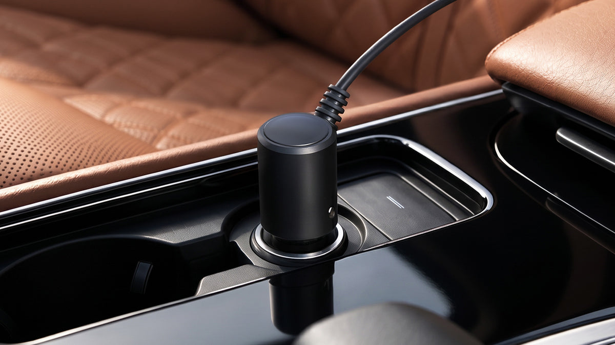 Power cable plugged into a car 12V cigarette lighter socket